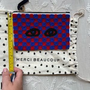 Unused Claire v beaded clutch